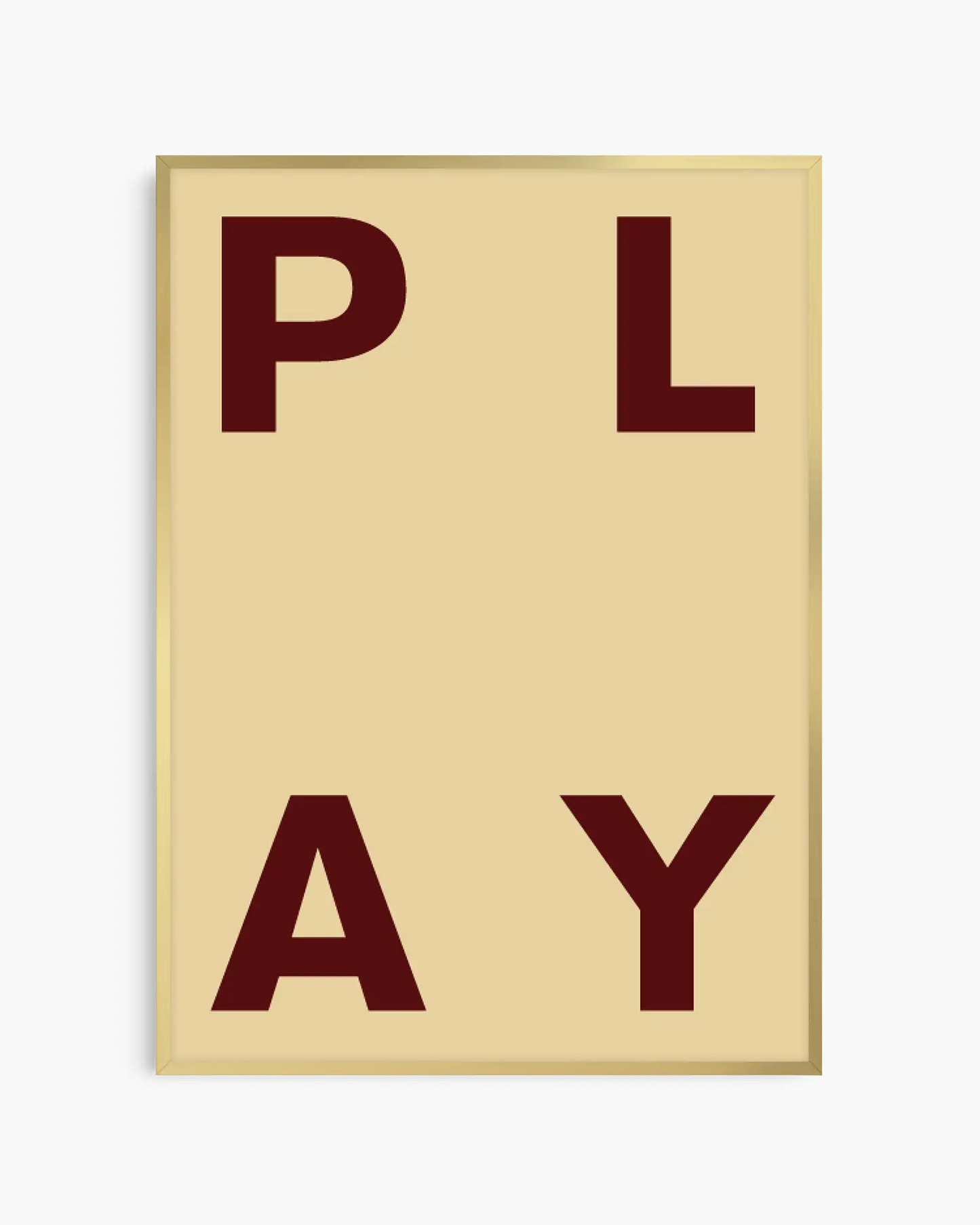 Beige nursery poster with maroon letters spelling 'PLAY' on a beige background framed in a gold frame.