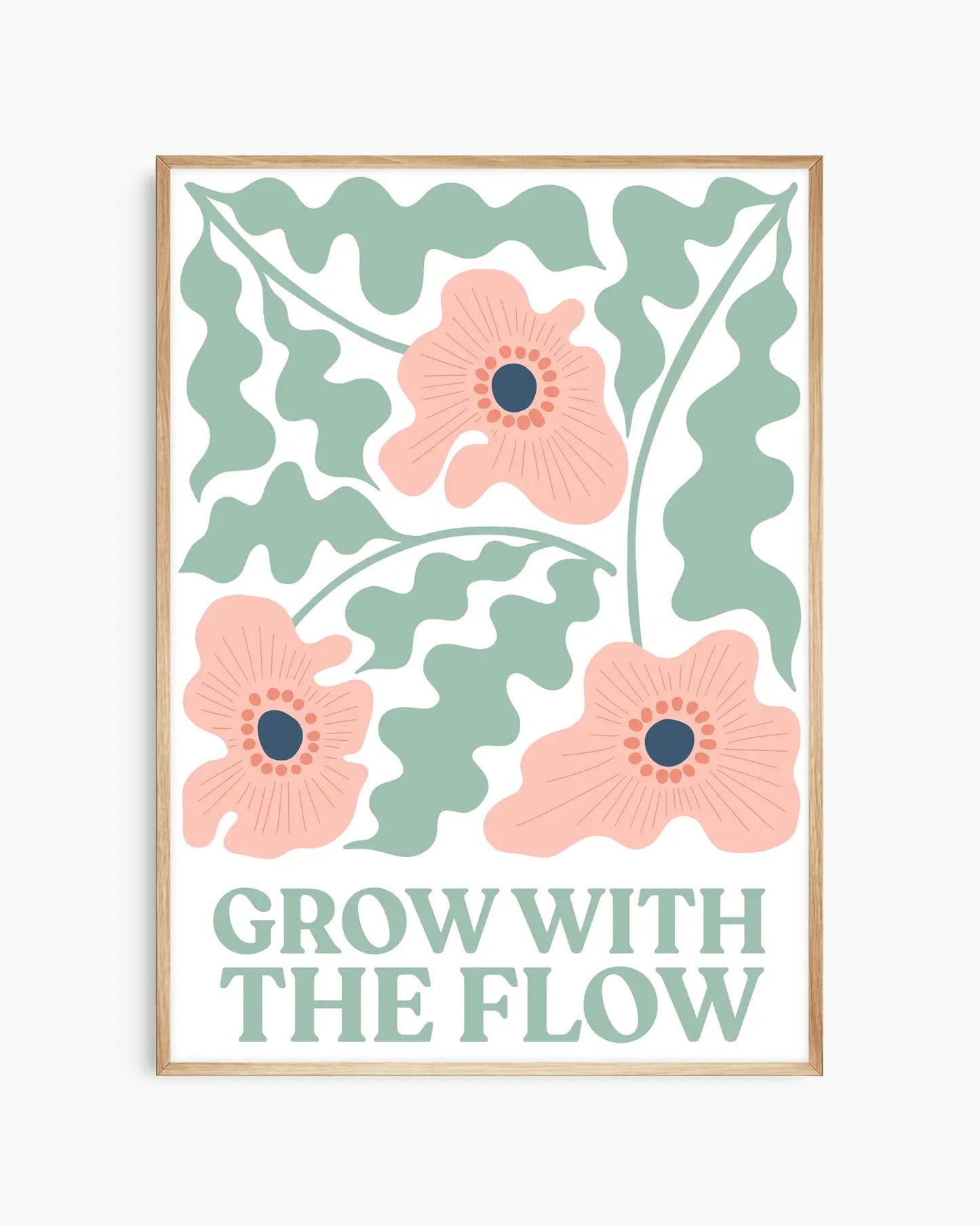 Nursery poster of flowers and the text 'Grow with the flow' written on it in green, framed in an oak frame