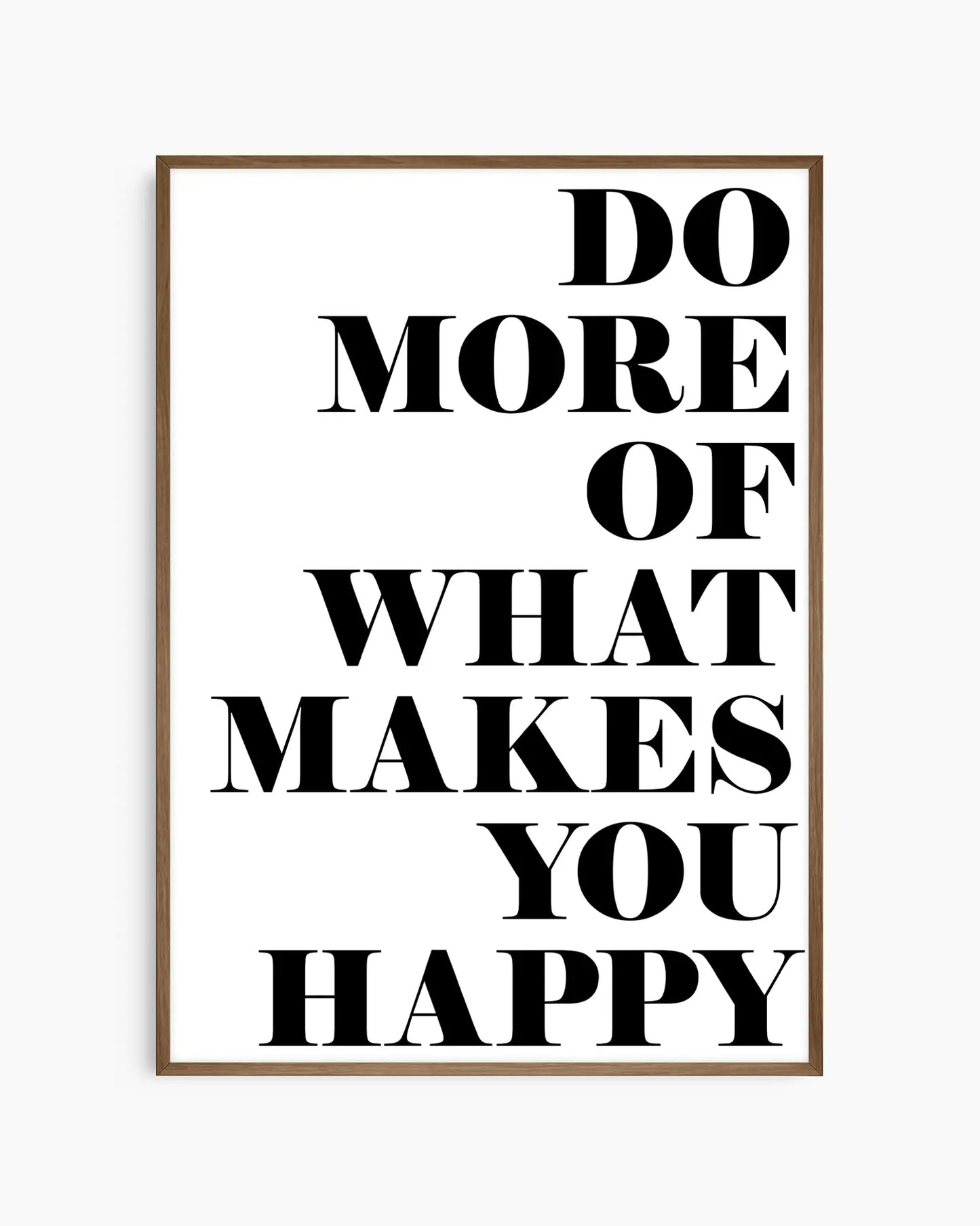 Motivational nursery poster with the text 'Do more of what makes you happy' written on a white background framed in a dark oak frame