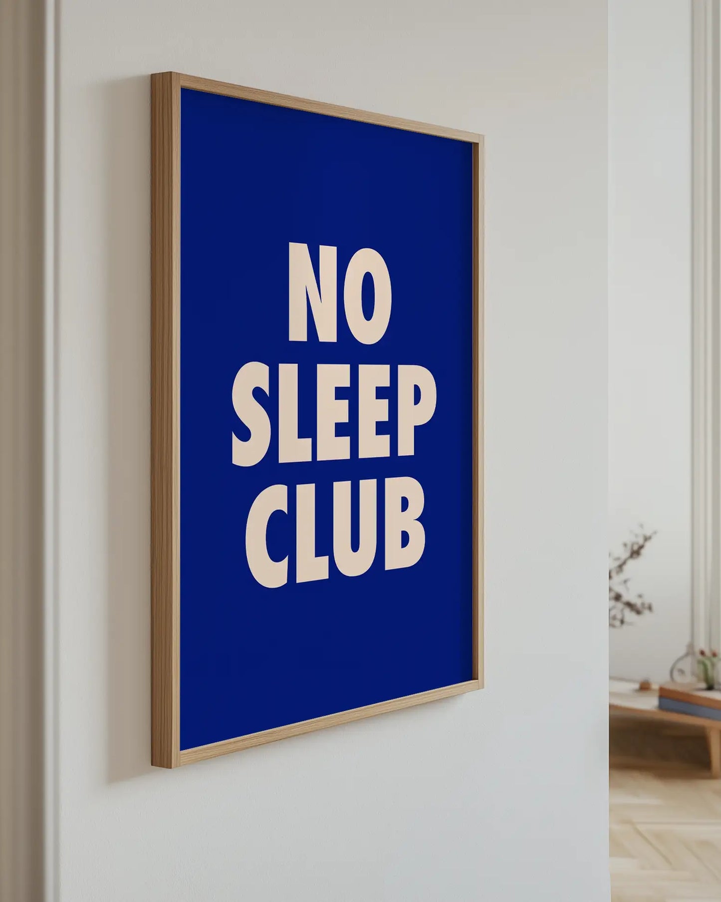 Poster with the text "No Sleep Club" on the wall