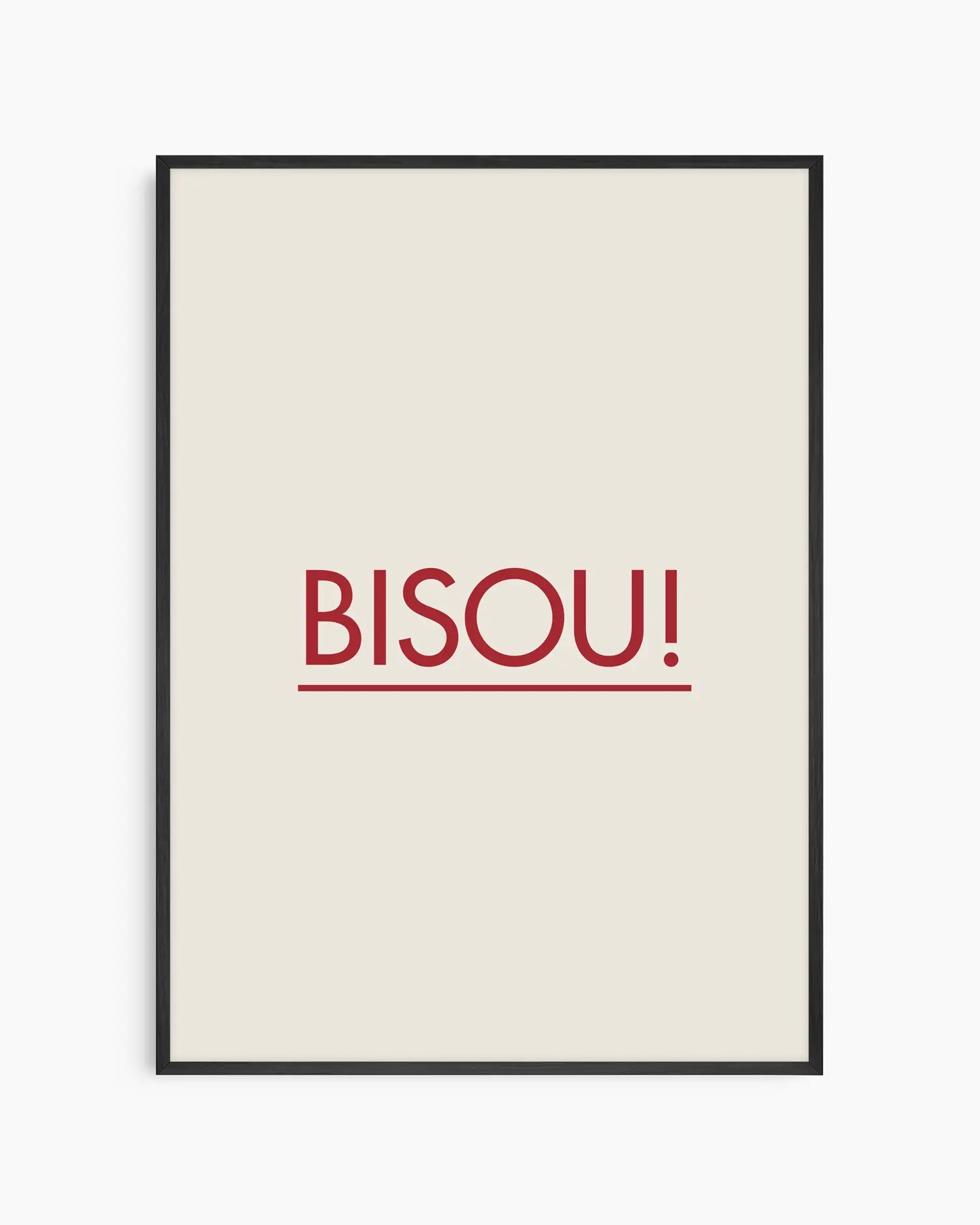 Framed poster with red 'BISOU!' text on a white background, framed in a black wooden frame.