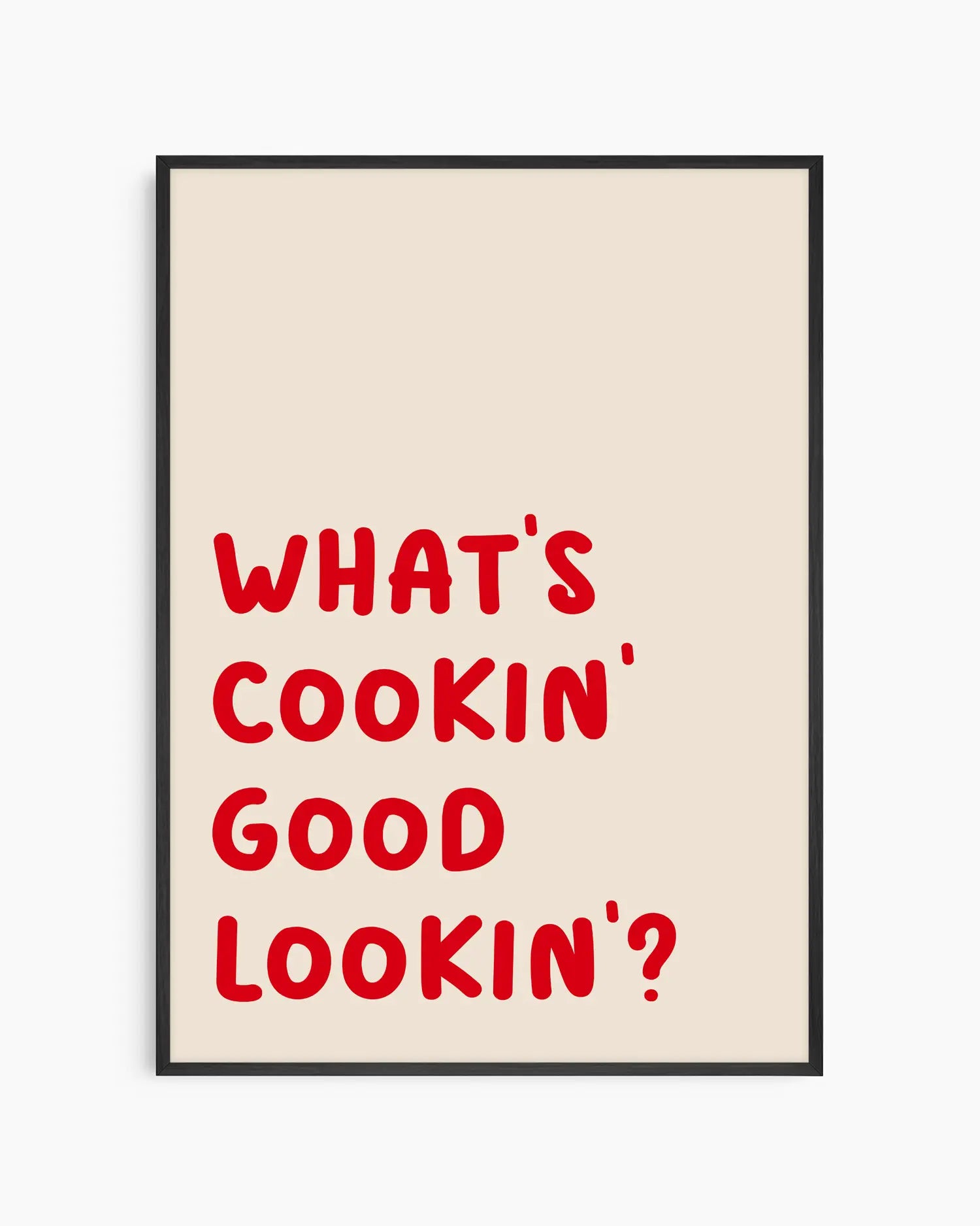 Nursery poster with red text saying 'What's cooking' good looking'?' in a black wooden frame.