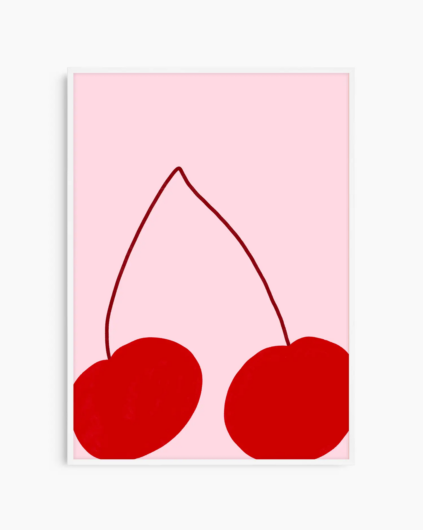 Framed artwork of two red cherries on a pink background