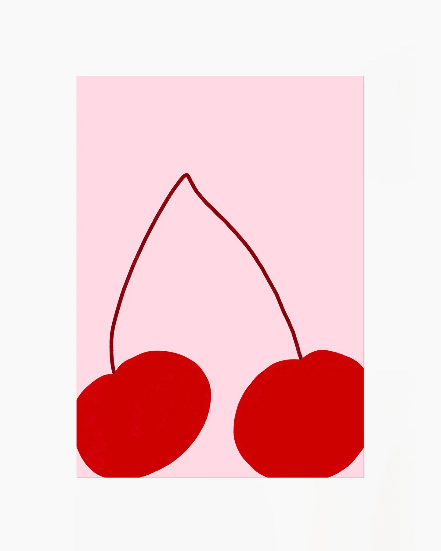Two red cherries on a pink background