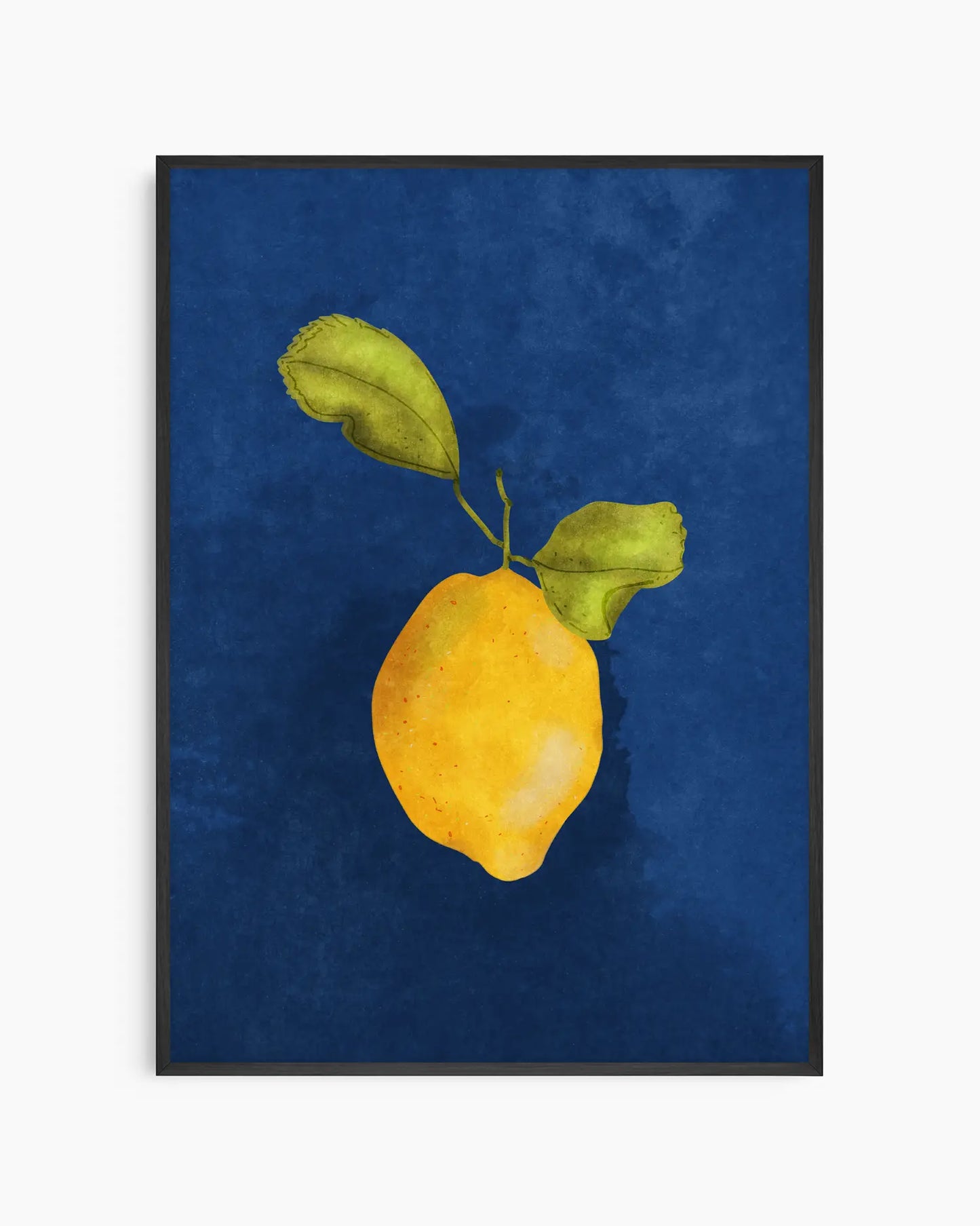 Framed artwork of a yellow lemon with green leaves on a blue background