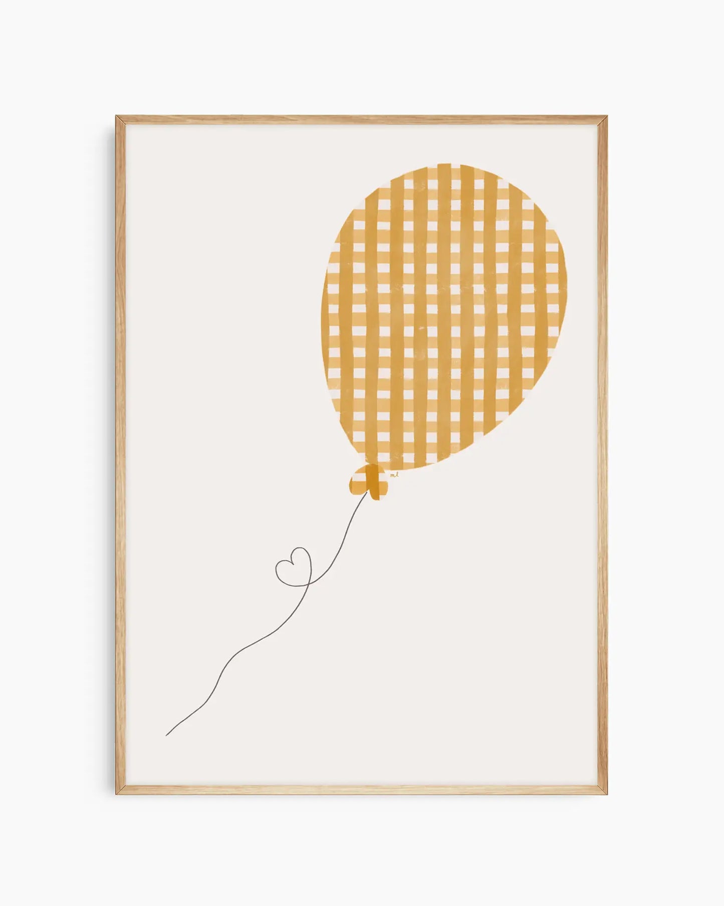 Framed artwork of a yellow checkered balloon on a white background