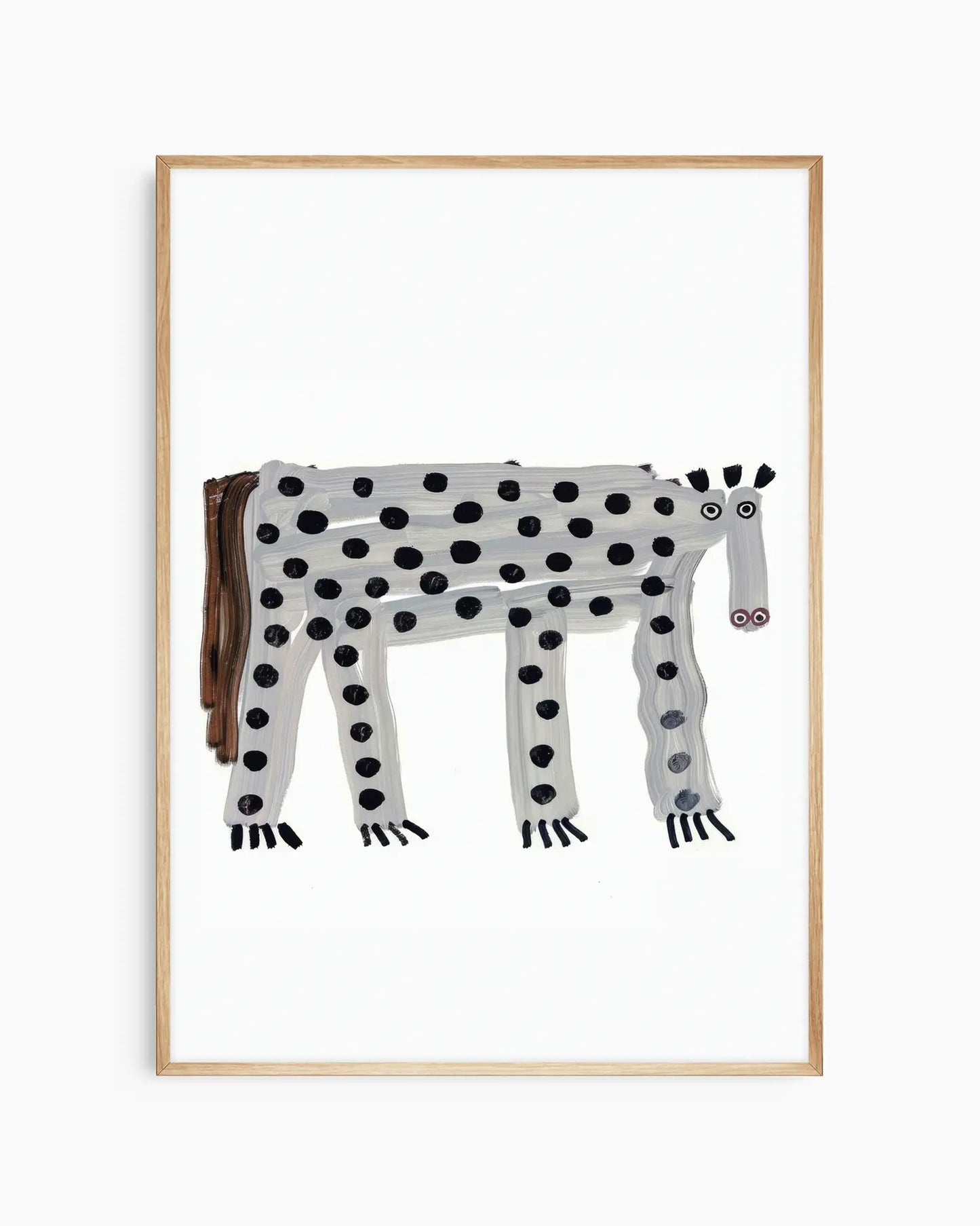 Framed artwork of a spotted animal on a white background