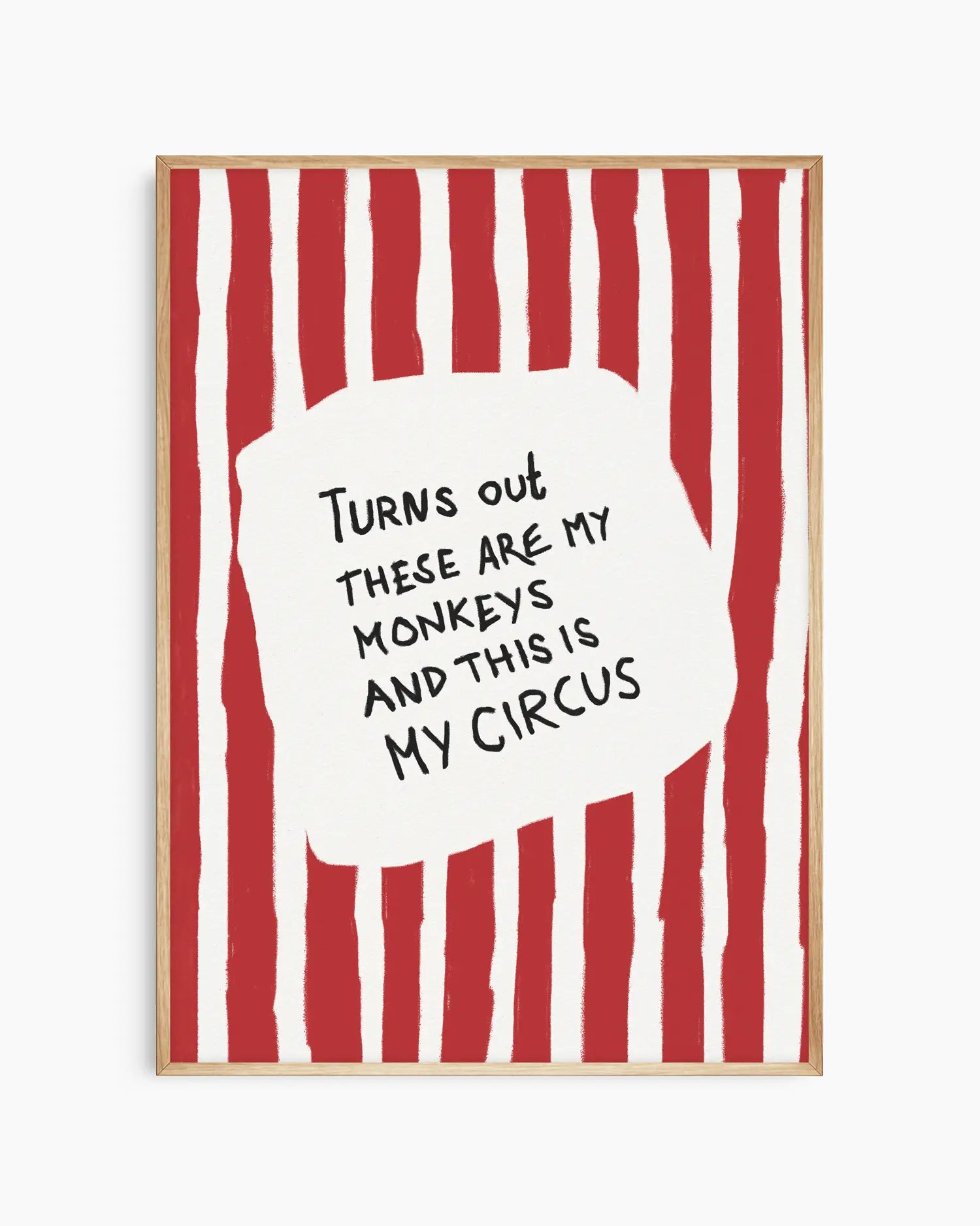 Nursery artwork with red and white striped background and text quote saying "Turns out these are my monkeys and this is my circus". Framed in a oak frame.