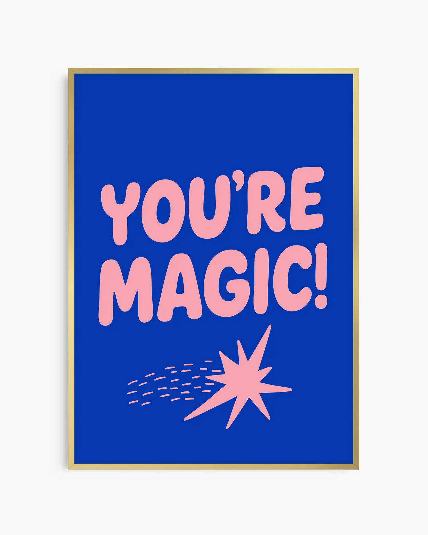 Framed blue nursery poster with pink text 'YOU'RE MAGIC!' and a shooting star