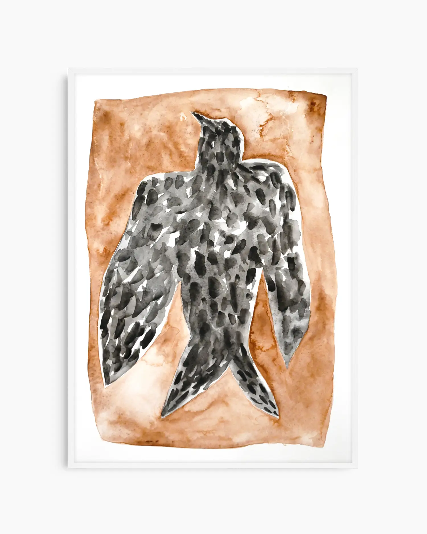 Artwork for the nursery of a black falcon on a brown background framed in a white frame.