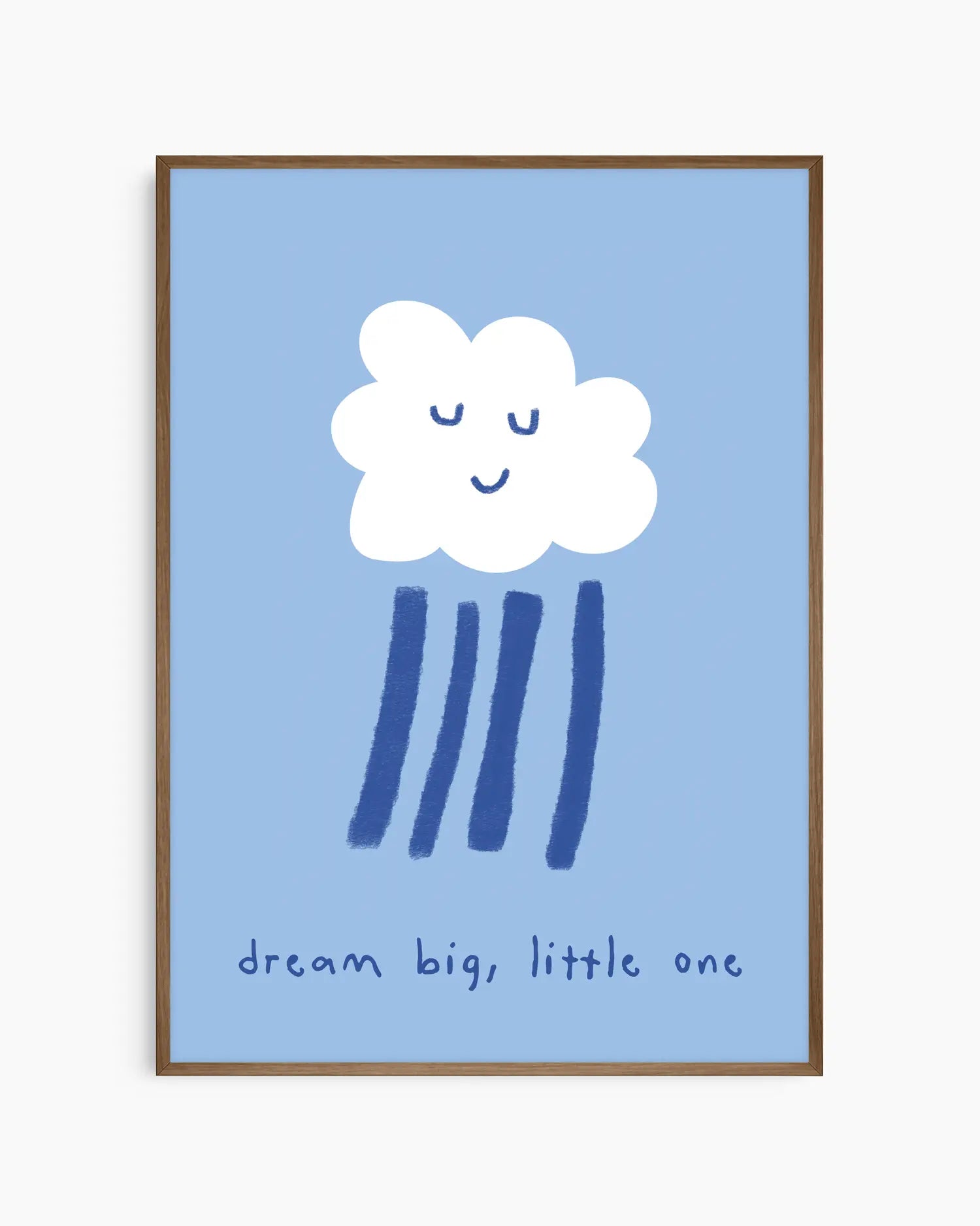 Blue poster of a white cloud with rain falling from it and the text 'dream big, little one' framed in a dark oak frame.