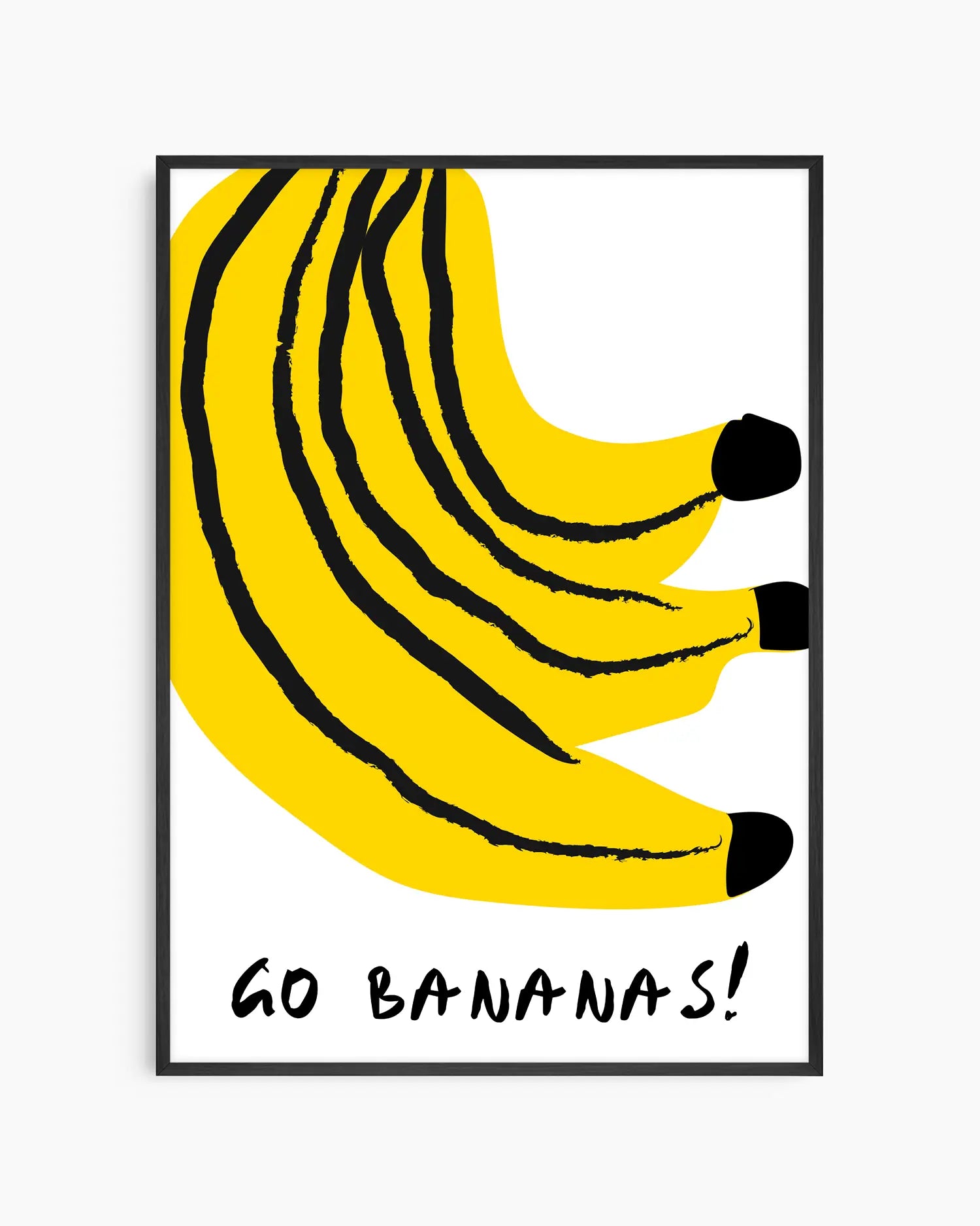 Nursery poster of bananas with the text 'GO BANANAS!' on a white background framed in black frame
