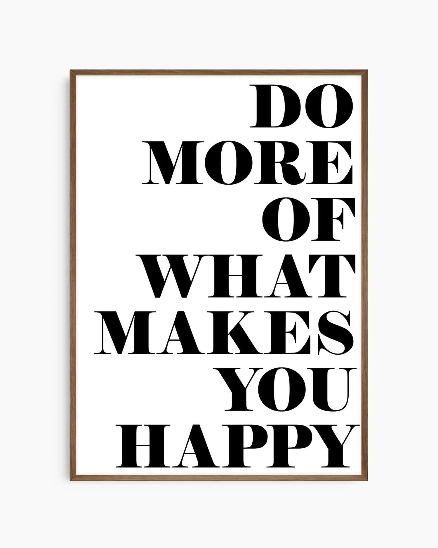 Motivational nursery poster with the text 'Do more of what makes you happy' written on a white background framed in a dark oak frame