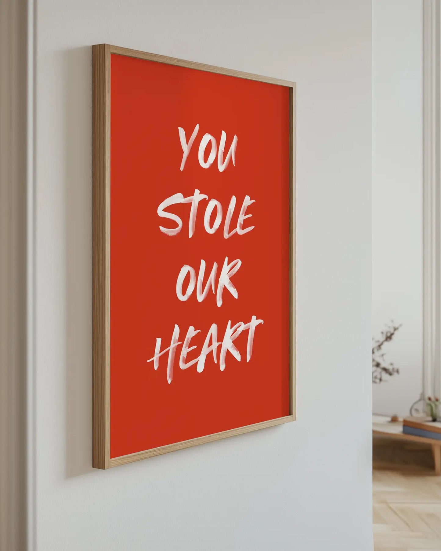 Poster with the text "You stole our heart" on the wall