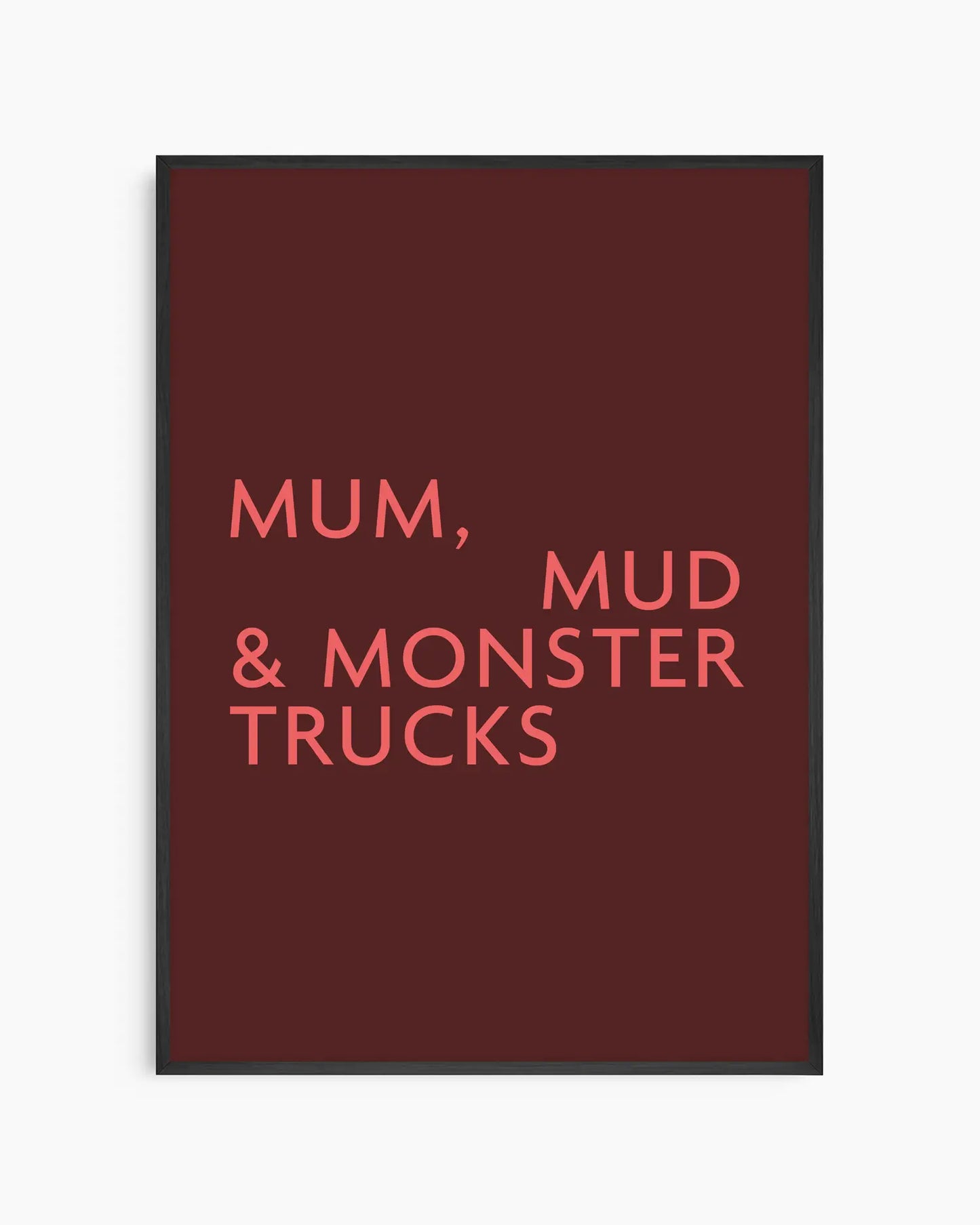 Poster with red text 'MUM, MUD & MONSTER TRUCKS' on a burgundy background in a black wooden frame.