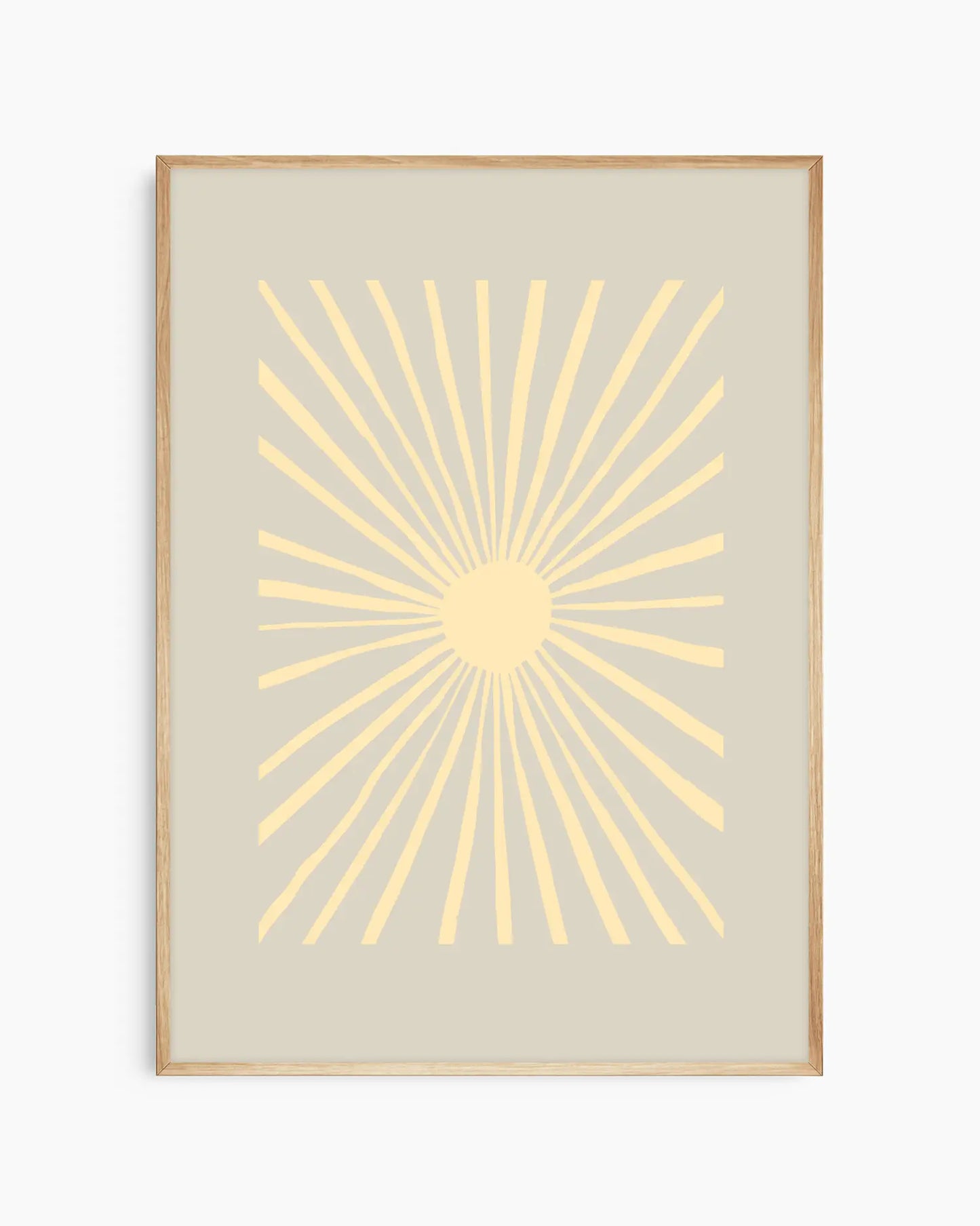 Framed artwork with a yellow sunburst design on a beige background