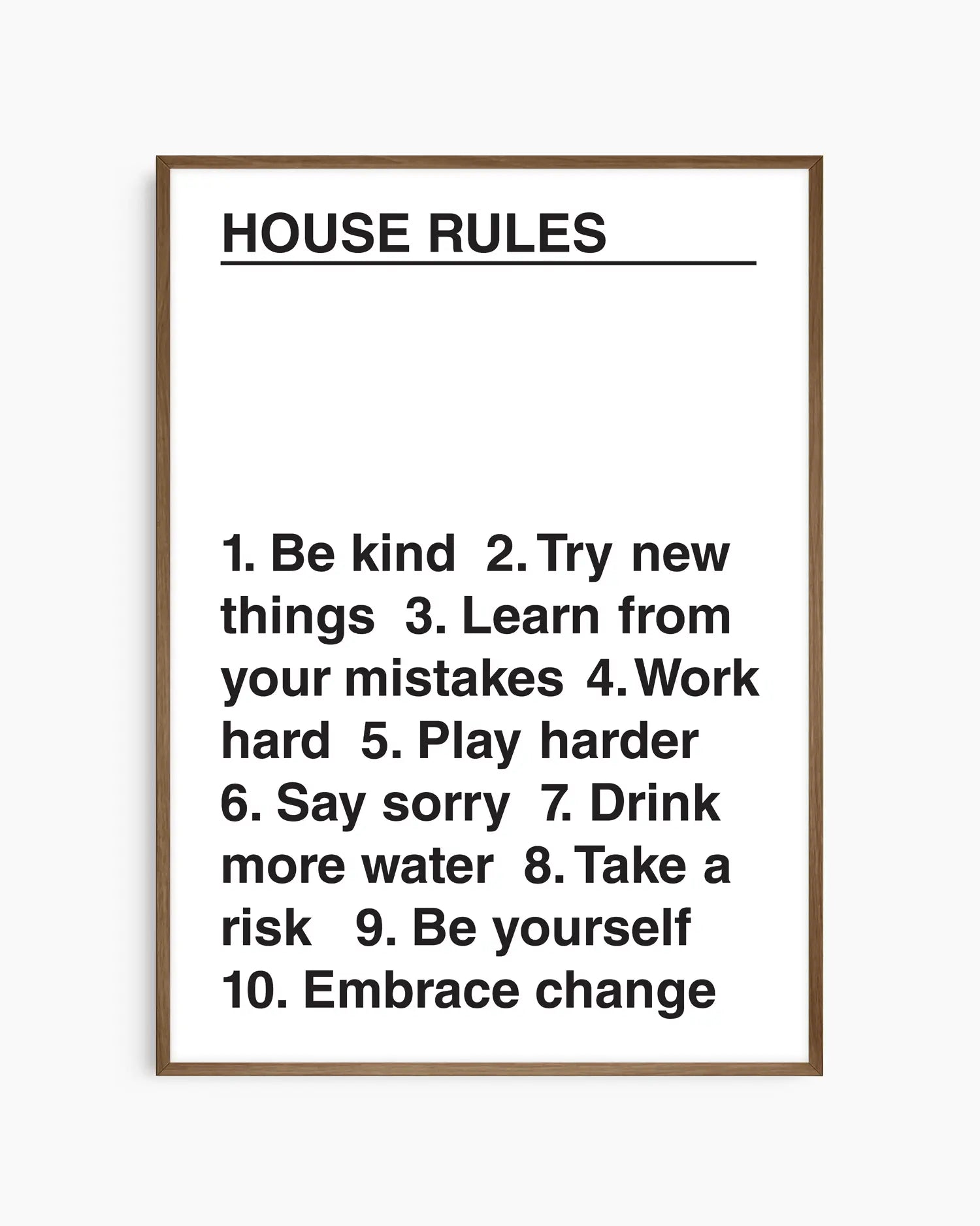 Framed list of house rules on a white background