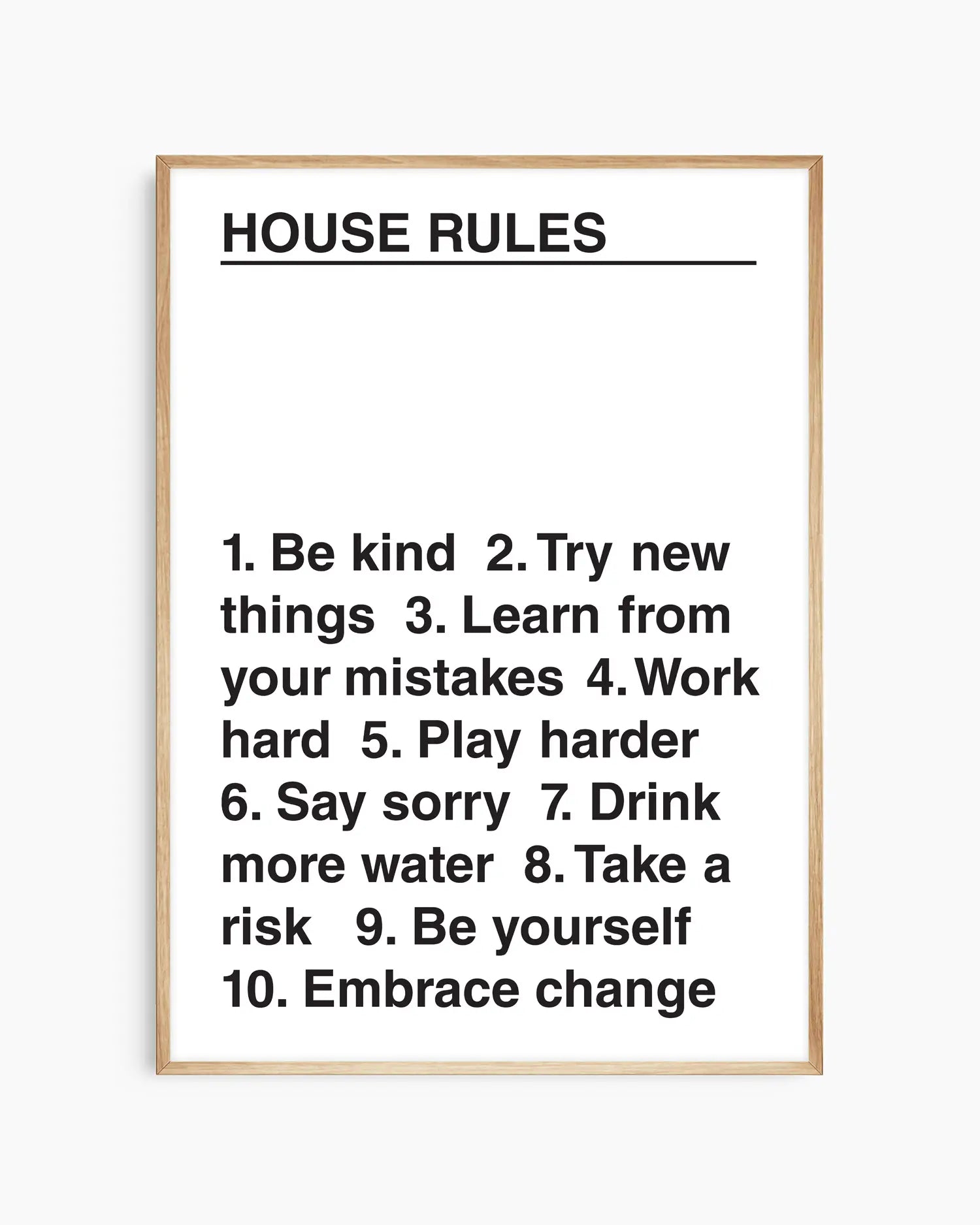 Framed poster with 'House Rules' text on a white background