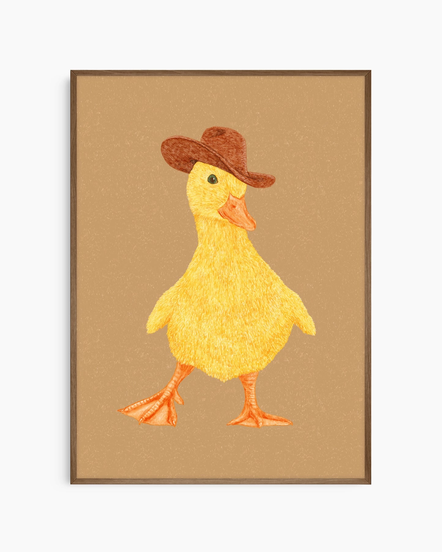 Framed artwork of a yellow duck wearing a brown hat on a beige background