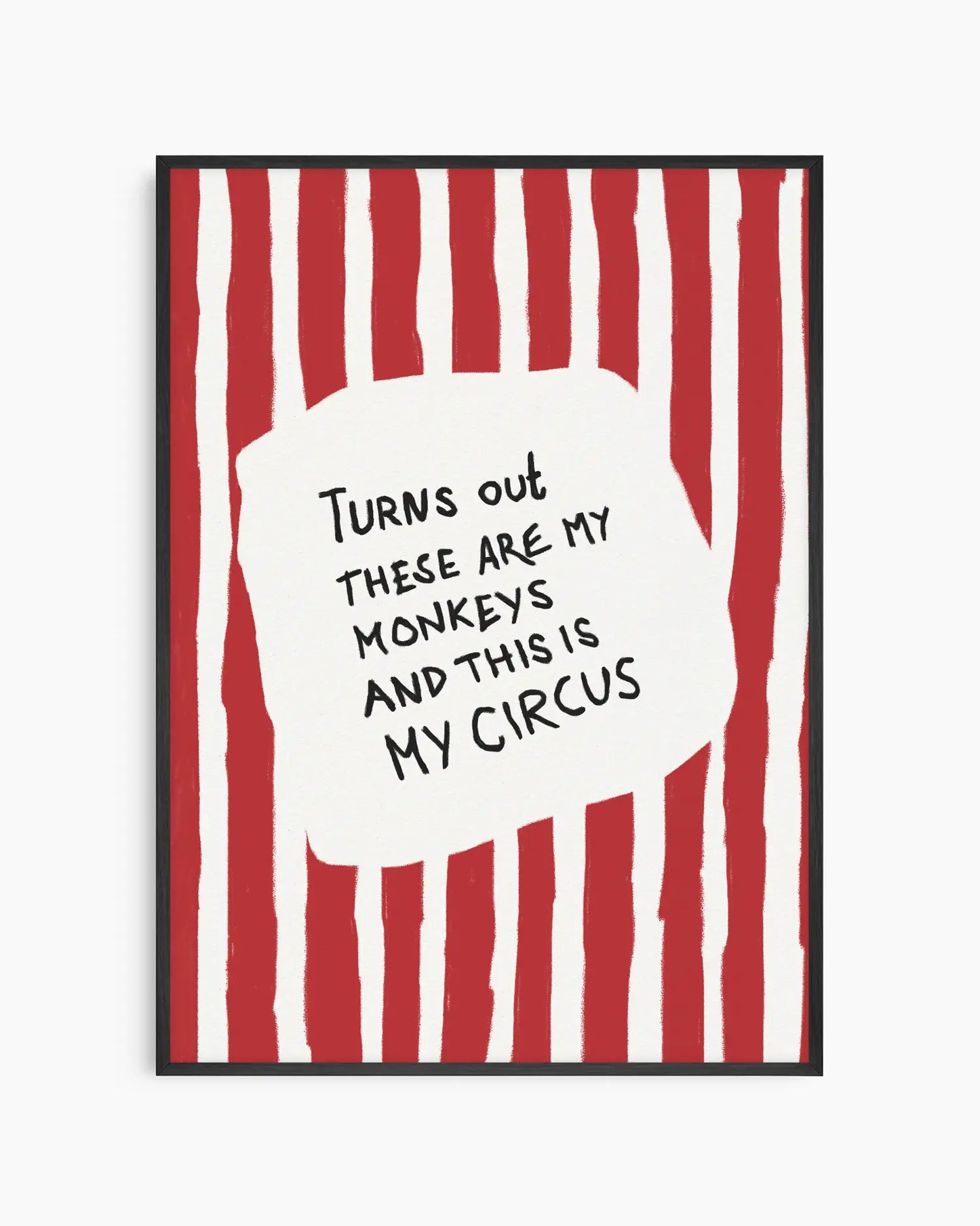 Nursery artwork with red and white striped background and text quote saying "Turns out these are my monkeys and this is my circus". Framed in a black wooden frame.